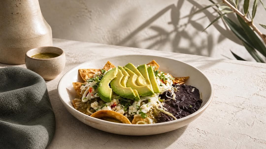 Chilaquiles with avocado and black beans